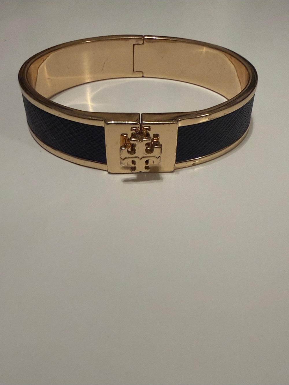 Tory Burch Black and Gold Logo Hinged Bracelet
